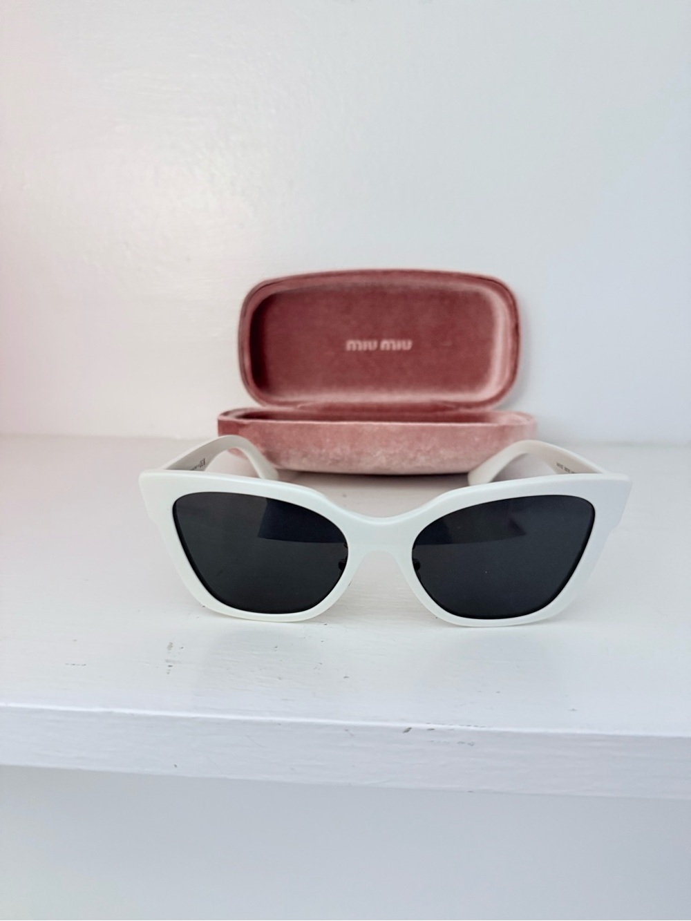 Miu Miu White Cat-Eye Sunglasses with Black Lenses